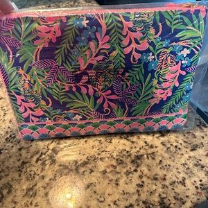 Lilly Pulitzer Brand new tech pouch.  Never used